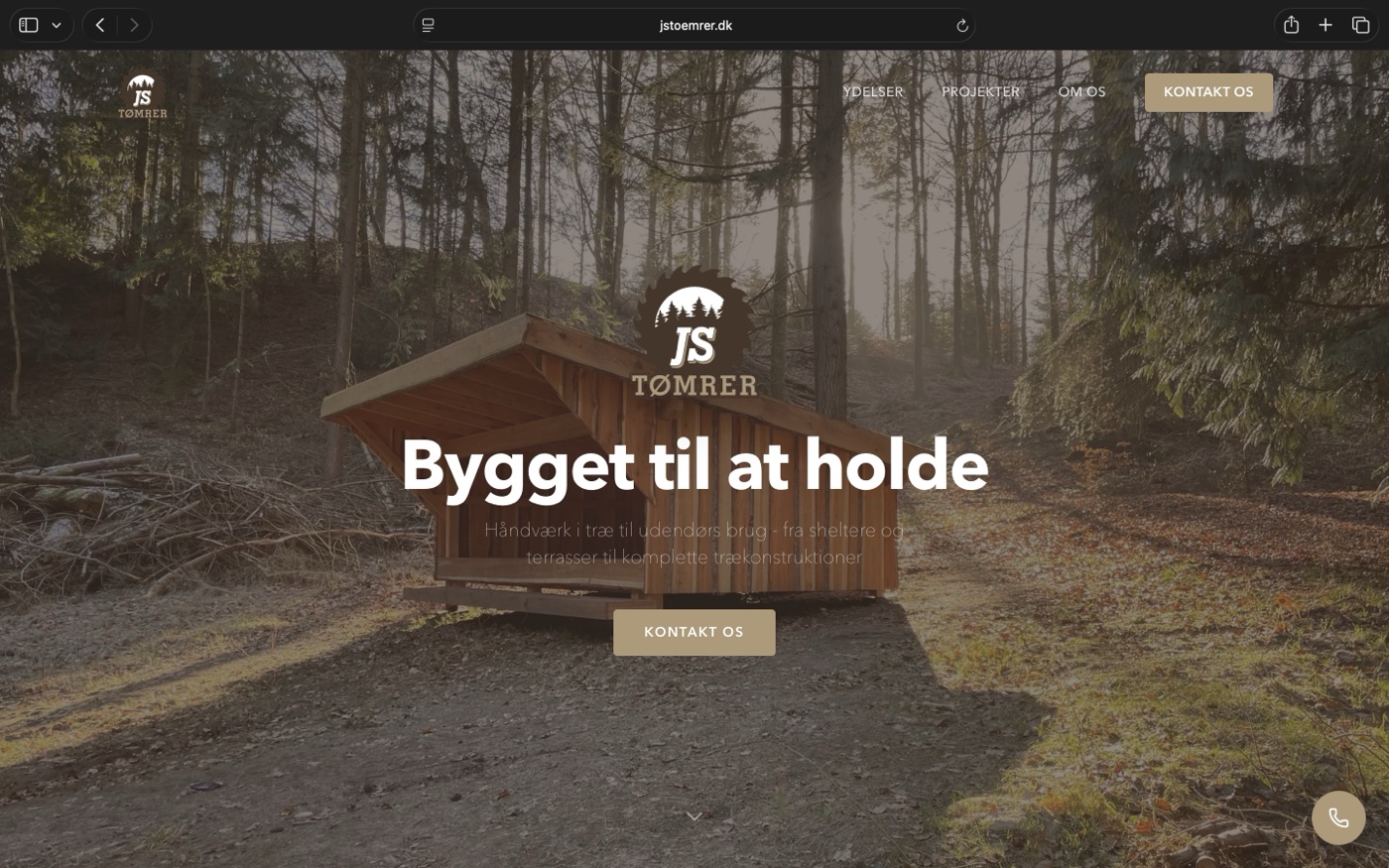 JS Tømrer hjemmesidens forside med et stort shelter i marken